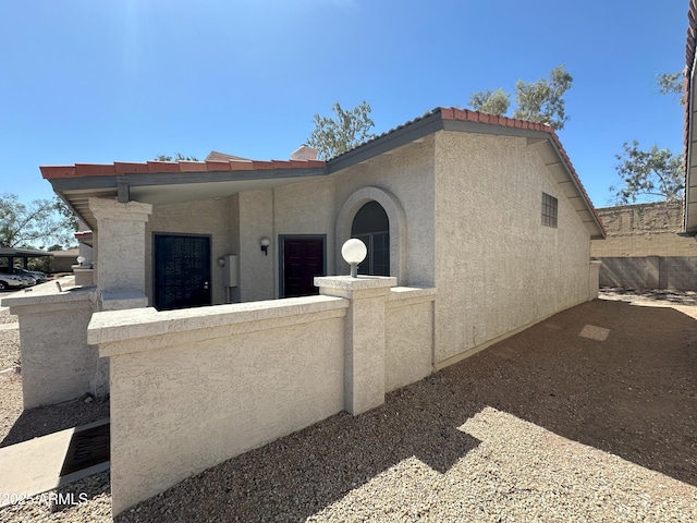 1718 S Longmore St Unit 53, Mesa, AZ 85202 - view of front of home featuring stucco siding