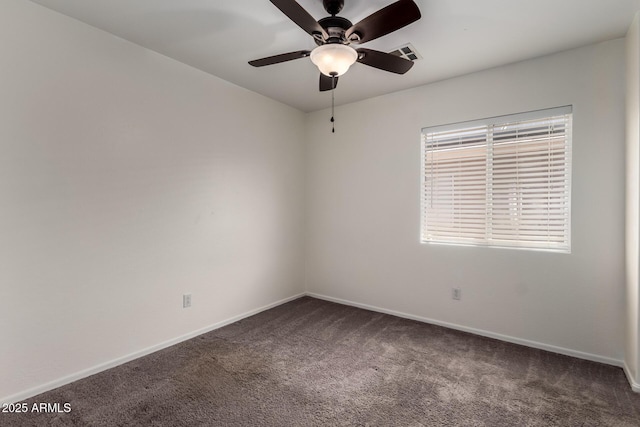 unfurnished room with a ceiling fan, baseboards, visible vents, and carpet