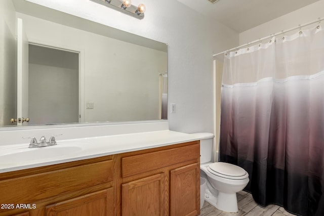 full bath featuring vanity, toilet, wood finished floors, and a shower with shower curtain
