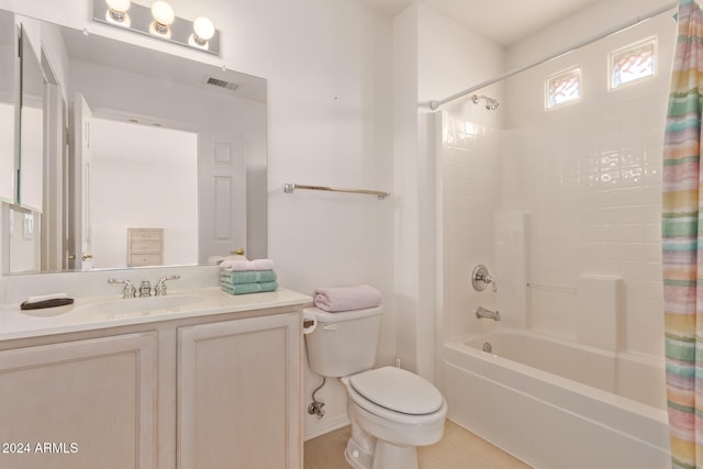 full bathroom featuring vanity, shower / bath combination with curtain, and toilet