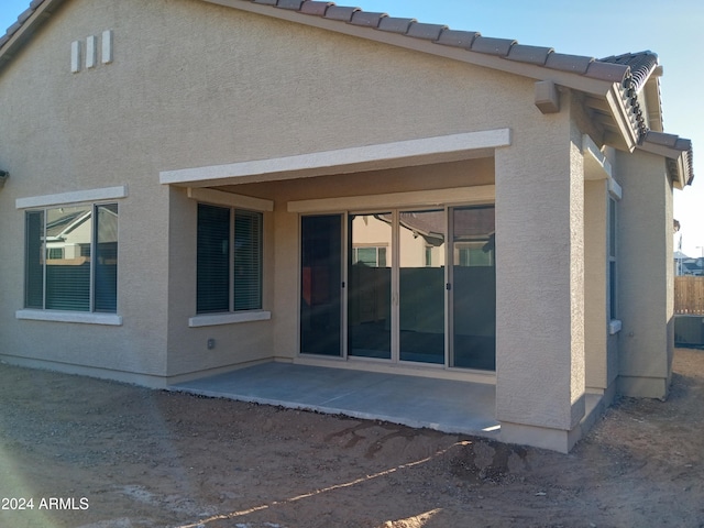 rear view of property with a patio