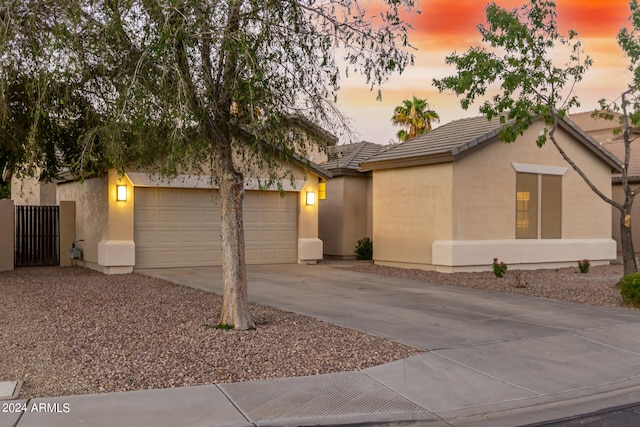 view of front of property featuring a garage