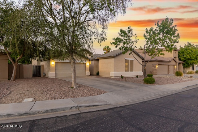 view of front of property with a garage