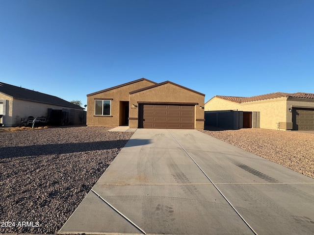 single story home with a garage