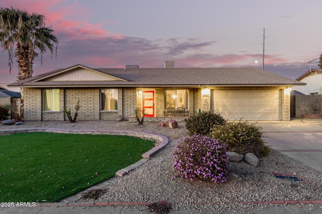 single story home with a garage