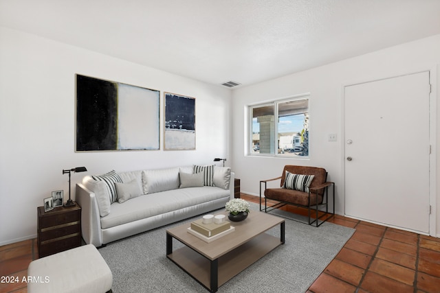 living room featuring tile patterned floors