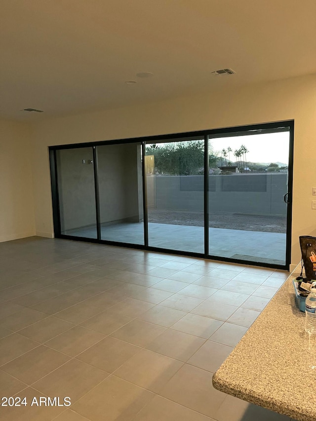 view of tiled empty room