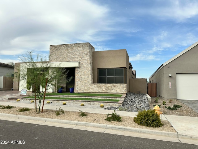 view of front of home featuring a garage