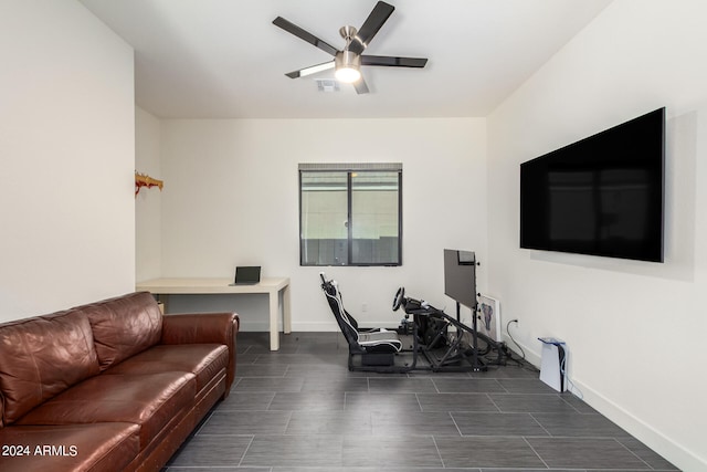 living room with ceiling fan