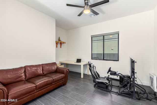 office with ceiling fan and dark hardwood / wood-style floors