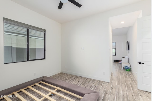 bedroom with light wood-type flooring