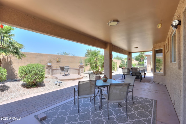 view of patio / terrace with outdoor dining area and a fenced backyard