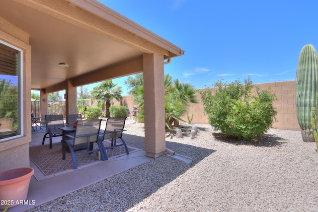 view of patio featuring a fenced backyard