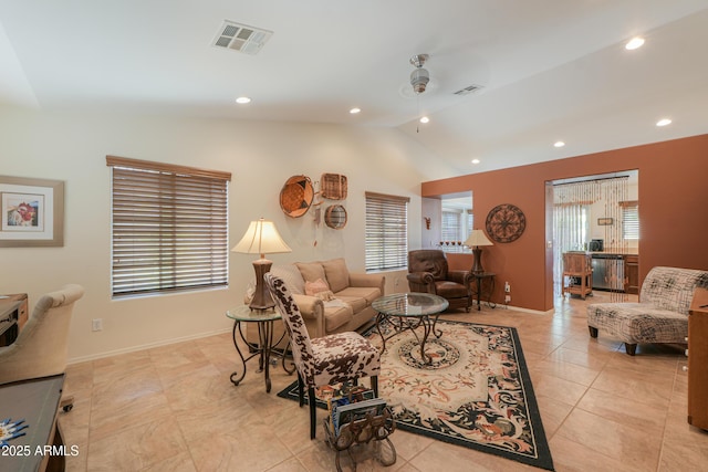 living area featuring recessed lighting, visible vents, a ceiling fan, and vaulted ceiling