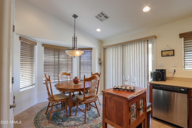 dining area with light tile patterned floors, visible vents, recessed lighting, and vaulted ceiling