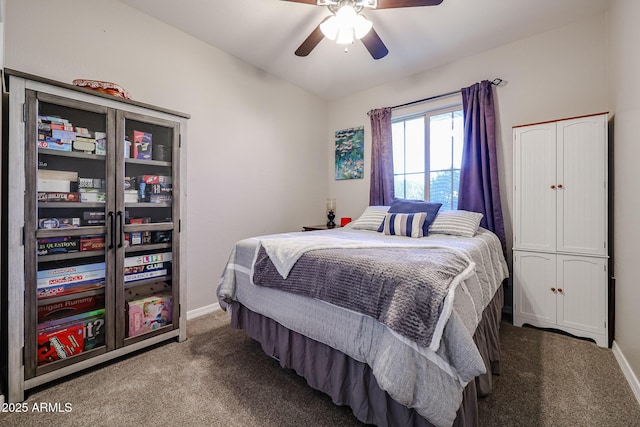 bedroom with ceiling fan and carpet