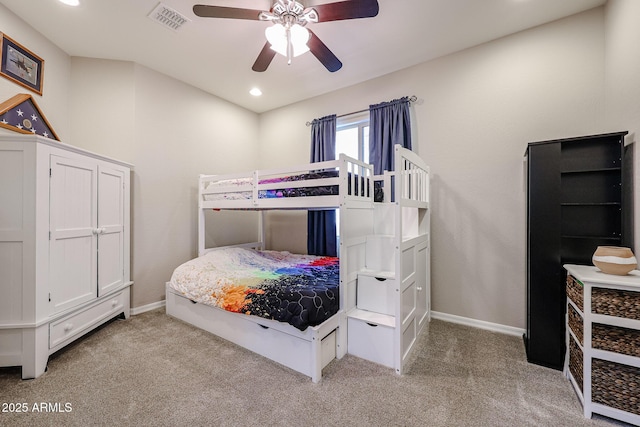 carpeted bedroom with ceiling fan