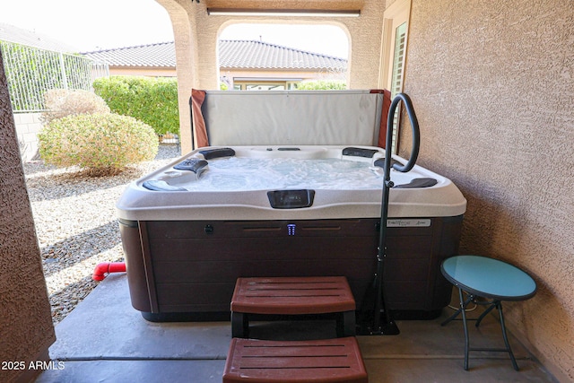 view of patio featuring a hot tub