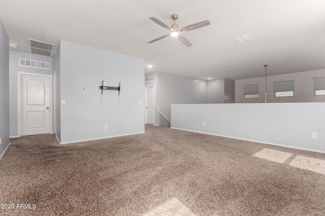 carpeted spare room with recessed lighting, visible vents, ceiling fan, and baseboards