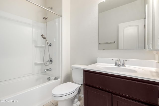 bathroom featuring tile patterned flooring, toilet, vanity, and  shower combination