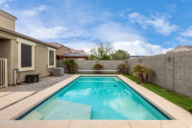 view of pool with central air condition unit, a fenced in pool, a fenced backyard, and a patio area