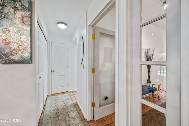 interior space featuring light tile patterned floors