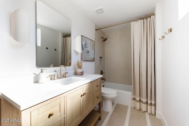 full bathroom featuring vanity, shower / bath combination with curtain, and toilet