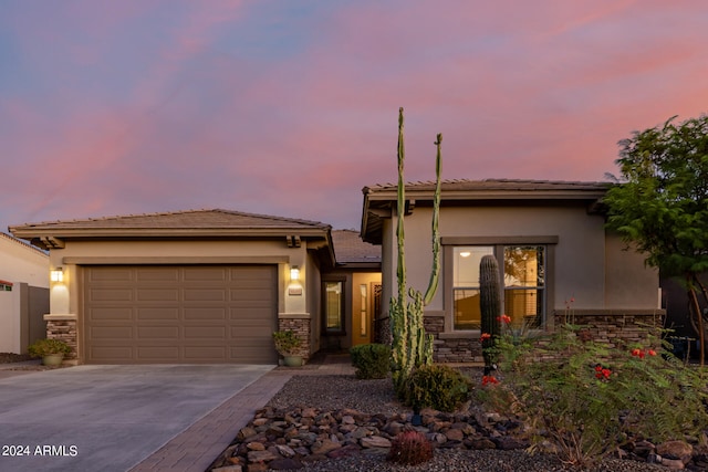 view of front of property featuring a garage