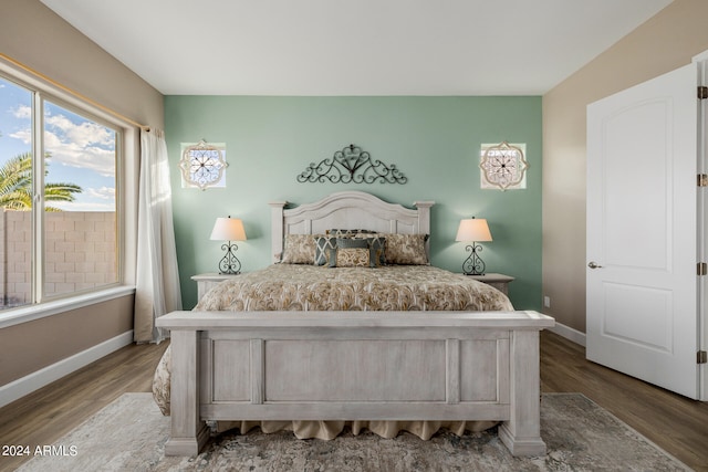 bedroom featuring wood-type flooring