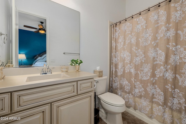 bathroom featuring ceiling fan, tile patterned flooring, vanity, and toilet