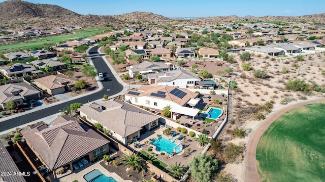 birds eye view of property featuring a mountain view