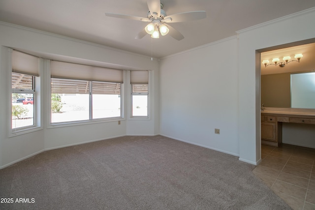 unfurnished bedroom featuring ensuite bathroom, tile patterned flooring, baseboards, carpet, and crown molding