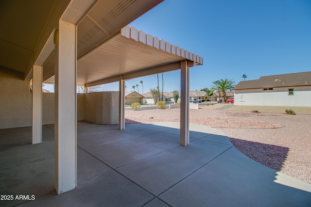 view of patio with a residential view