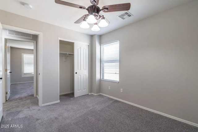 29891 N Desert Angel Dr, San Tan Valley, AZ 85143 - unfurnished bedroom featuring multiple windows, carpet floors, baseboards, and a closet
