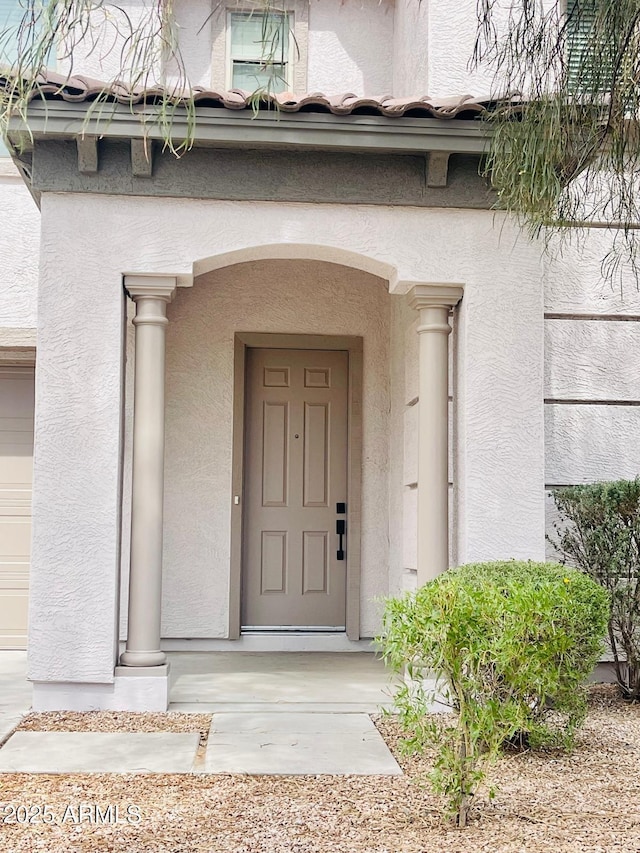 29891 N Desert Angel Dr, San Tan Valley, AZ 85143 - view of exterior entry featuring stucco siding