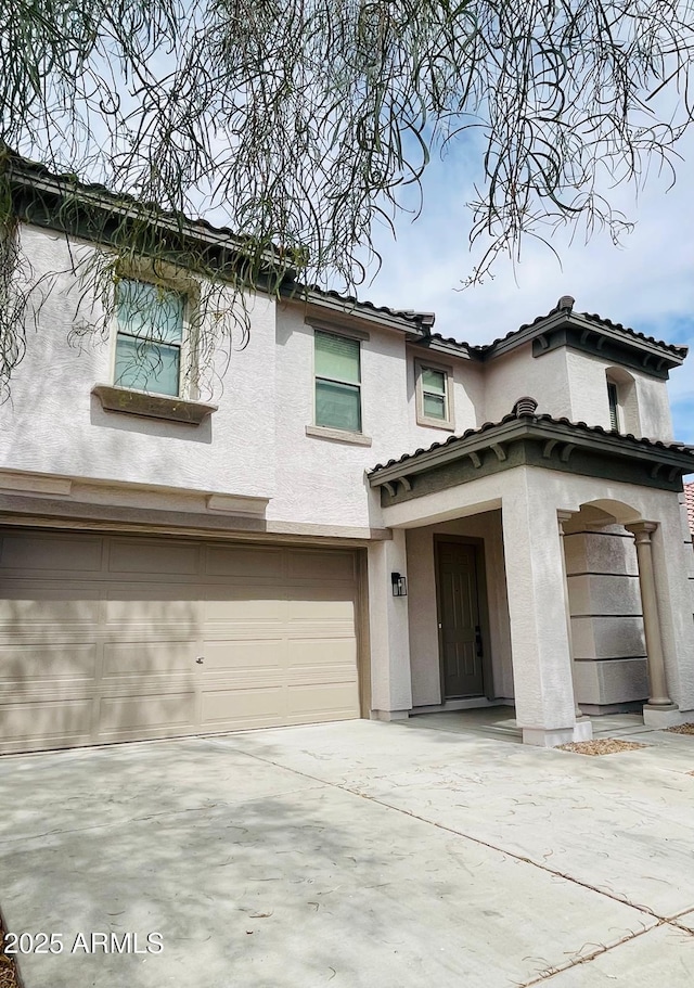 29891 N Desert Angel Dr, San Tan Valley, AZ 85143 - mediterranean / spanish home featuring stucco siding, a garage, driveway, and a tiled roof