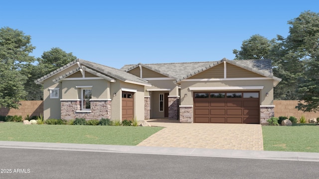 view of front facade with a garage and a front lawn