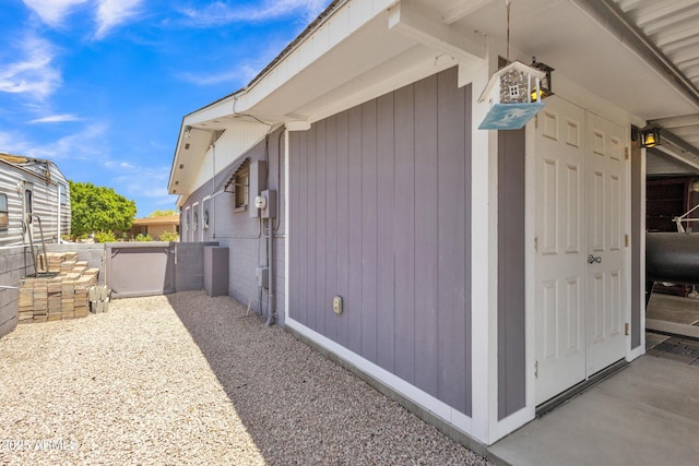view of home's exterior featuring fence