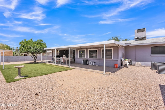 back of house with a patio, fence, a yard, and cooling unit