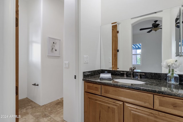 bathroom with vanity and ceiling fan