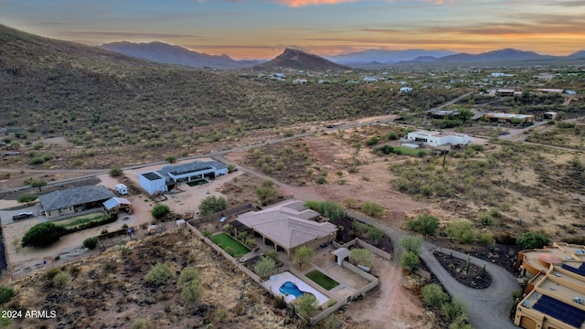 aerial view at dusk with a mountain view