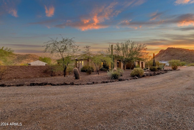 view of front of property with a mountain view