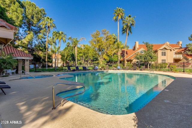 view of pool featuring a patio area