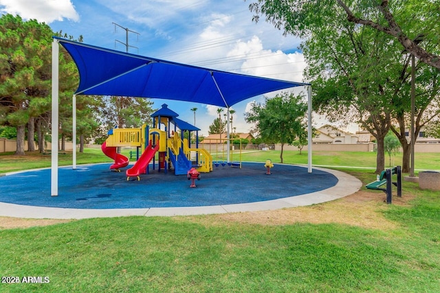 view of playground featuring a lawn