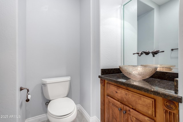 1407 E Artemis Trl, San Tan Valley, AZ 85140 - bathroom with baseboards, toilet, and vanity