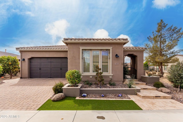 1407 E Artemis Trl, San Tan Valley, AZ 85140 - mediterranean / spanish-style house featuring a tile roof, stucco siding, driveway, and an attached garage