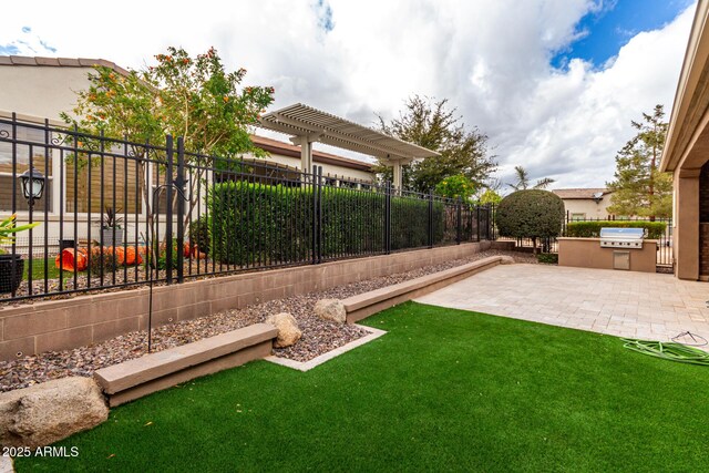 1407 E Artemis Trl, San Tan Valley, AZ 85140 - view of yard with exterior kitchen, a fenced backyard, a pergola, and a patio