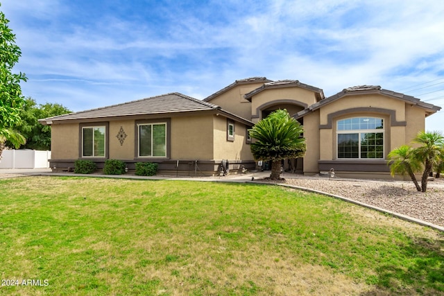 view of front of house with a front yard