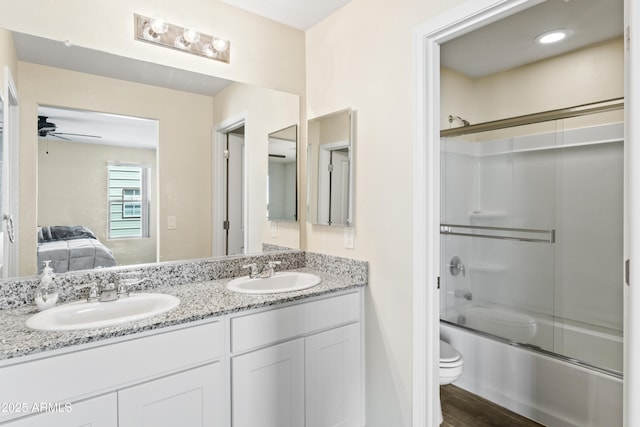 620 Vista Del Rio Ct, Wickenburg, AZ 85390 - bathroom featuring connected bathroom, toilet, a sink, and double vanity