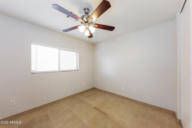 unfurnished room with light tile patterned flooring, visible vents, baseboards, and ceiling fan